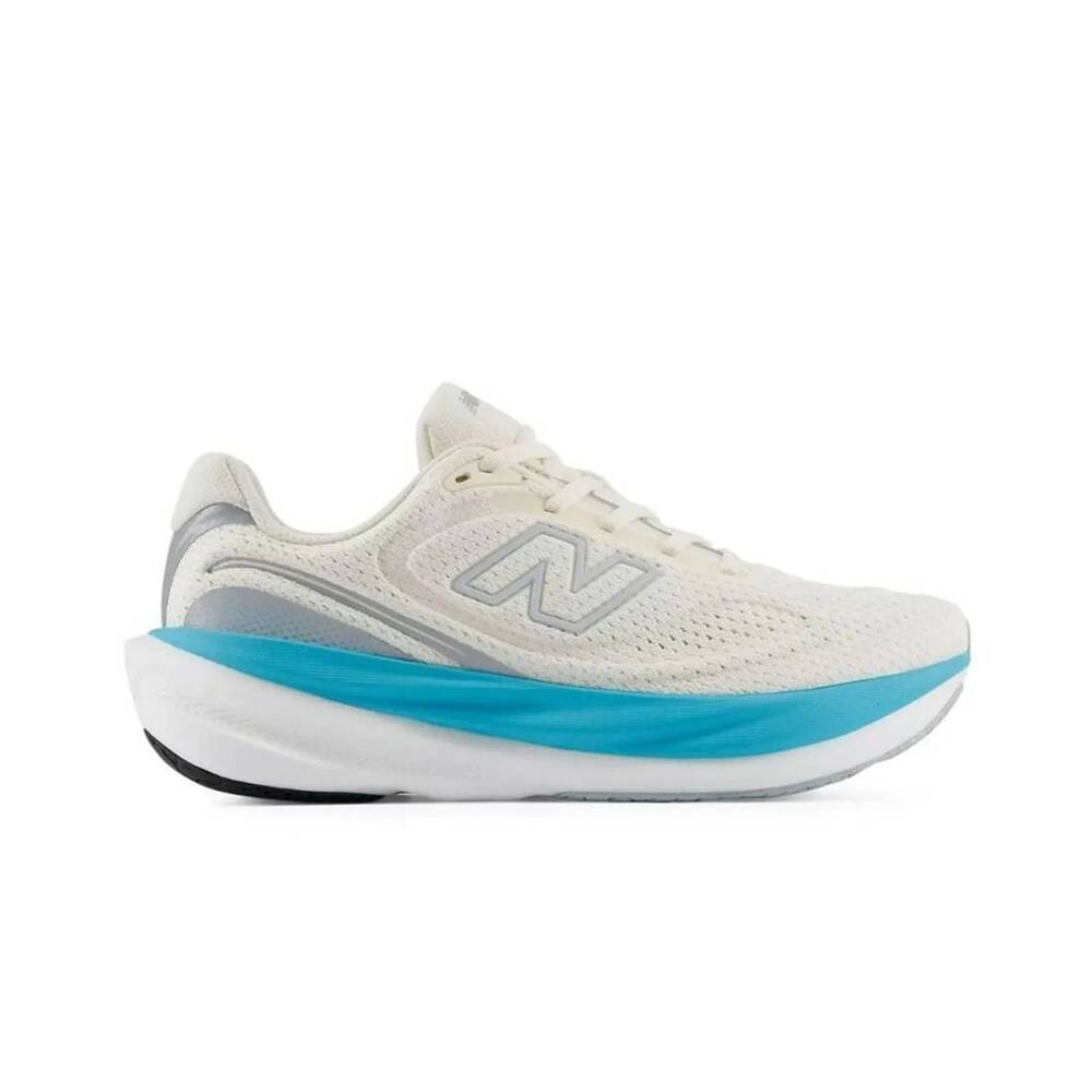 NEW NEW BALANCE women's 1080 v15 running shoe in beige /blue